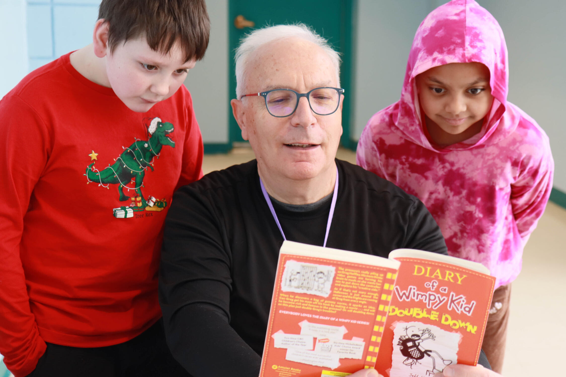Garry Sanders reading with students