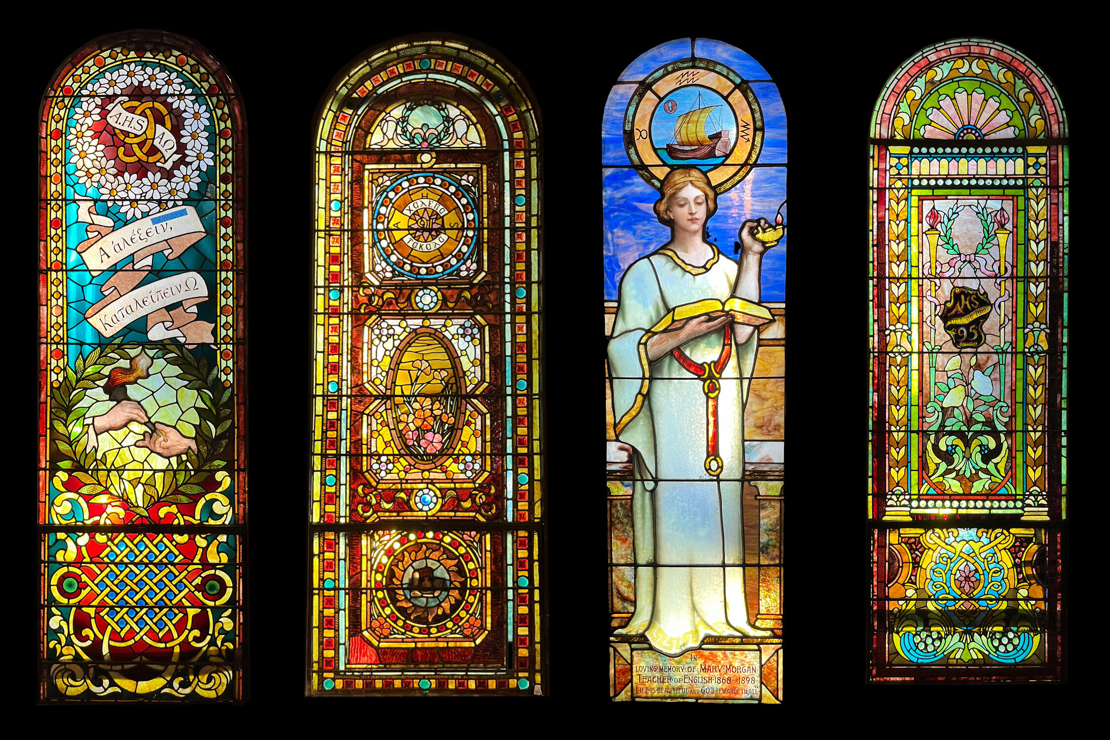 Four stained glass windows from the original Albany High School