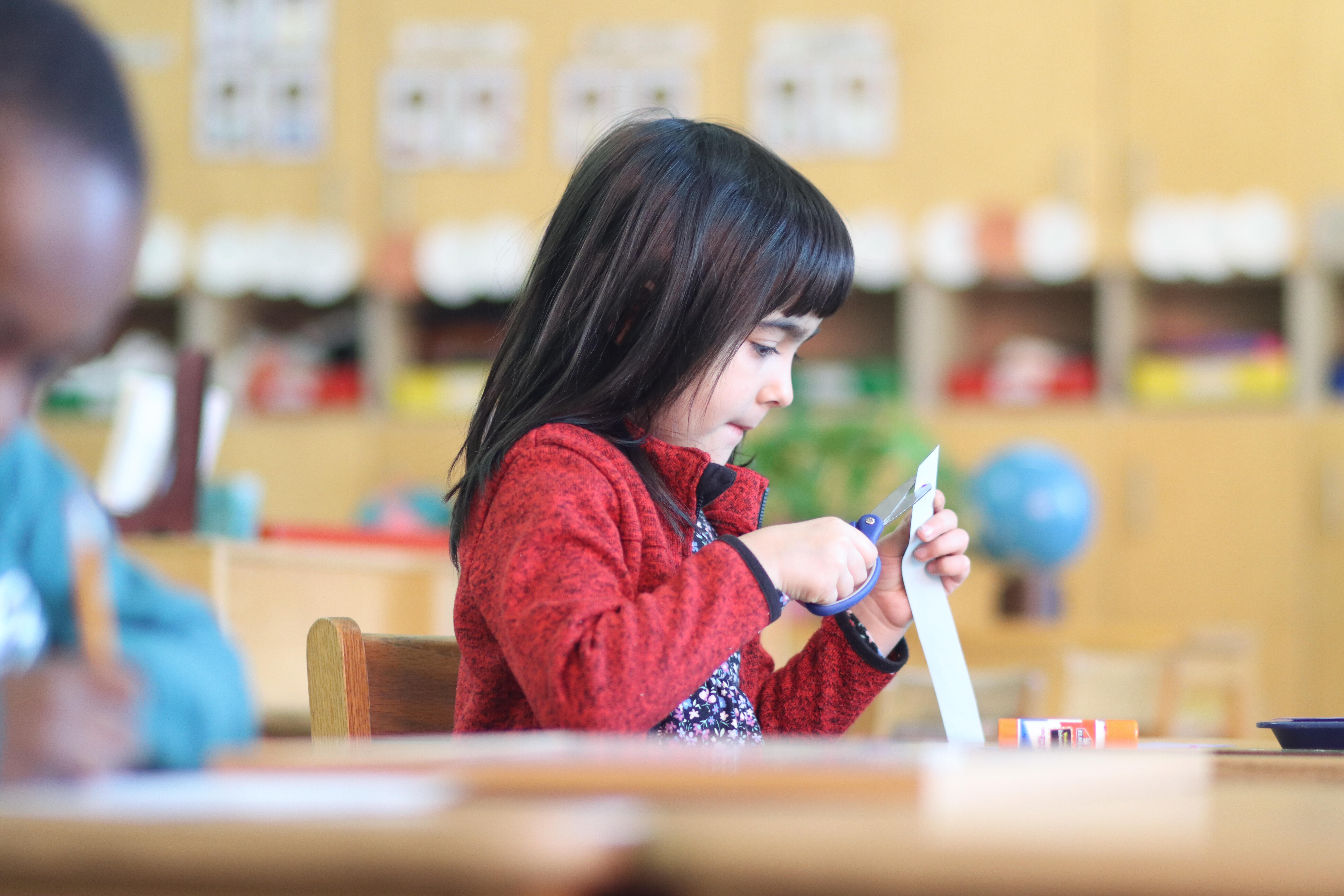 Pre-K student working in class
