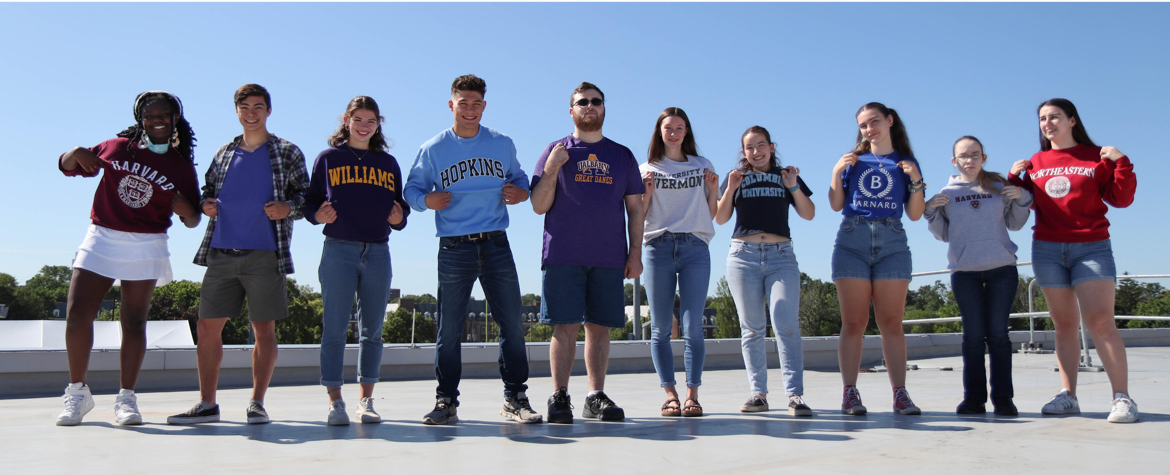 Top 10 Albany High seniors standing on the roof