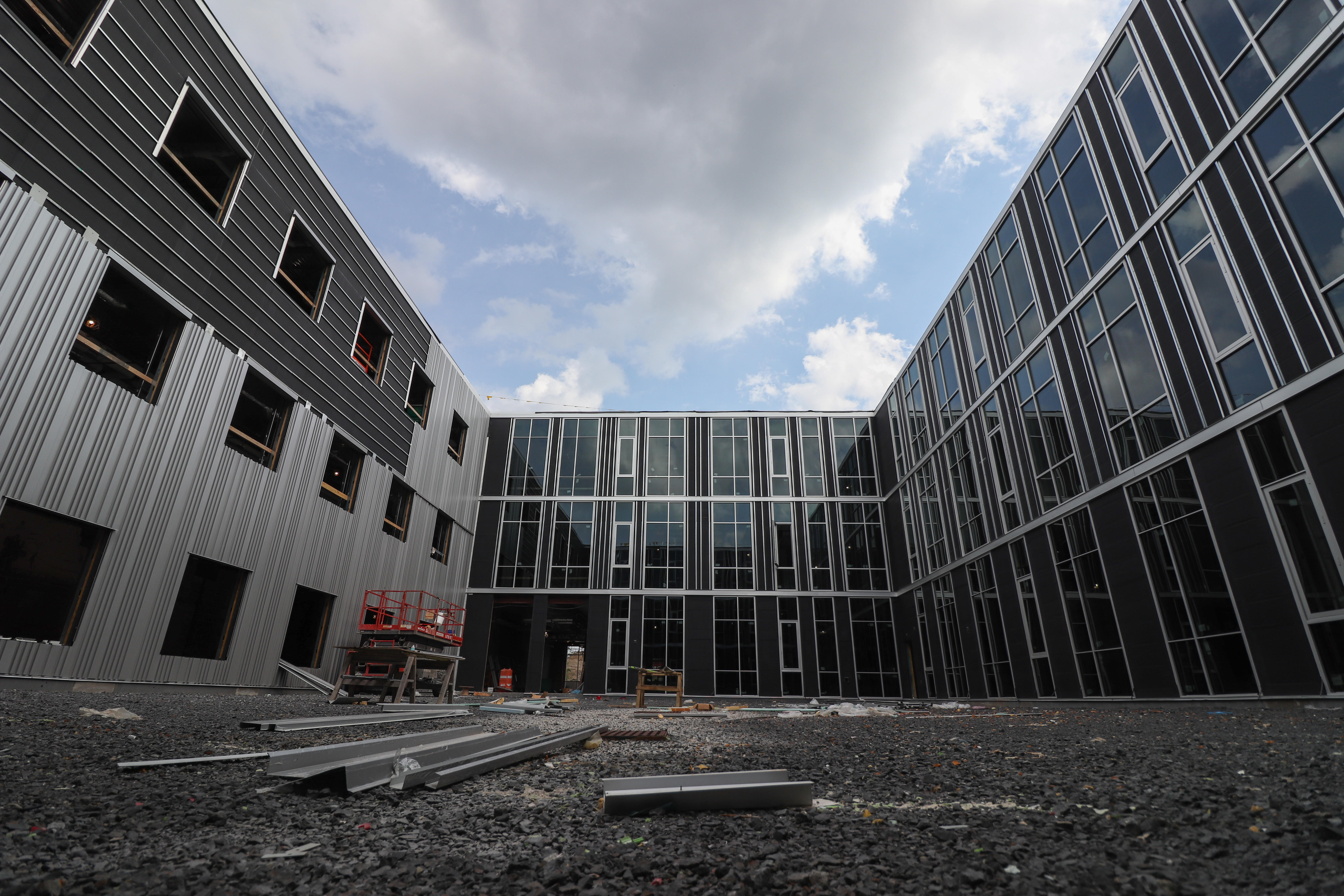 View of the new academic building as seen from the courtyard, looking up.